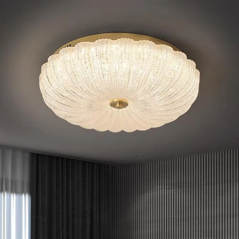 Art Deco-Inspired Crystal Flush-Mount Ceiling Light with Gold Base and Crystal Glass Glow. Available in 3 sizes